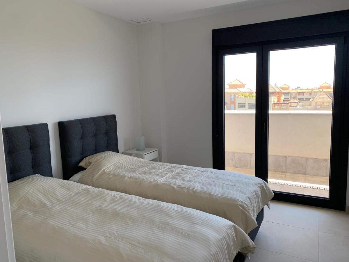 Appartement Penthouse With Wide Terrace Next To The Ocean à Huelva Extérieur photo